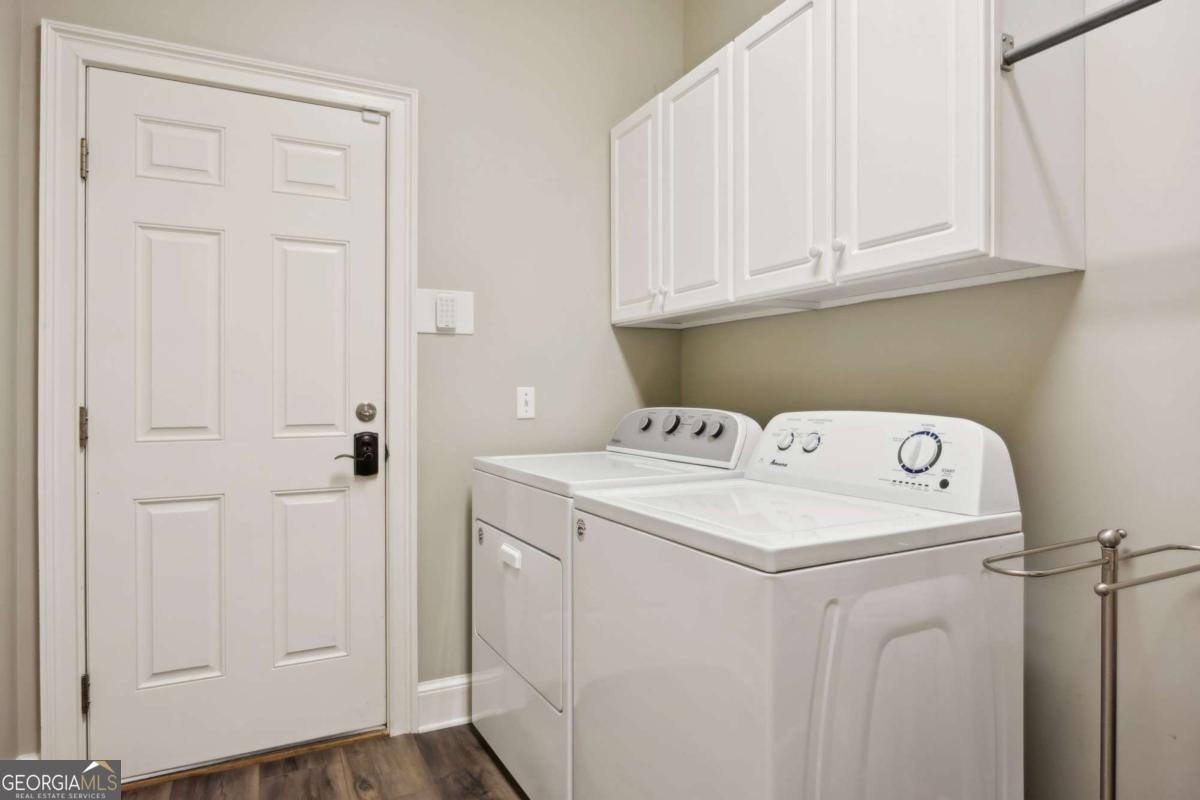 343 Major Wright Road St. Simons, GA 31522 - Photo 35 of 53 a utility room with dryer and washer