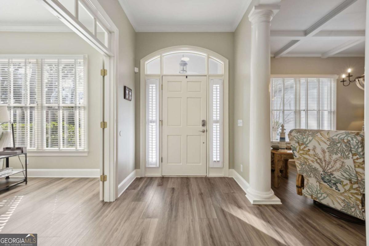 343 Major Wright Road St. Simons, GA 31522 - Photo 5 of 53 a view of livingroom with furniture and wooden floor
