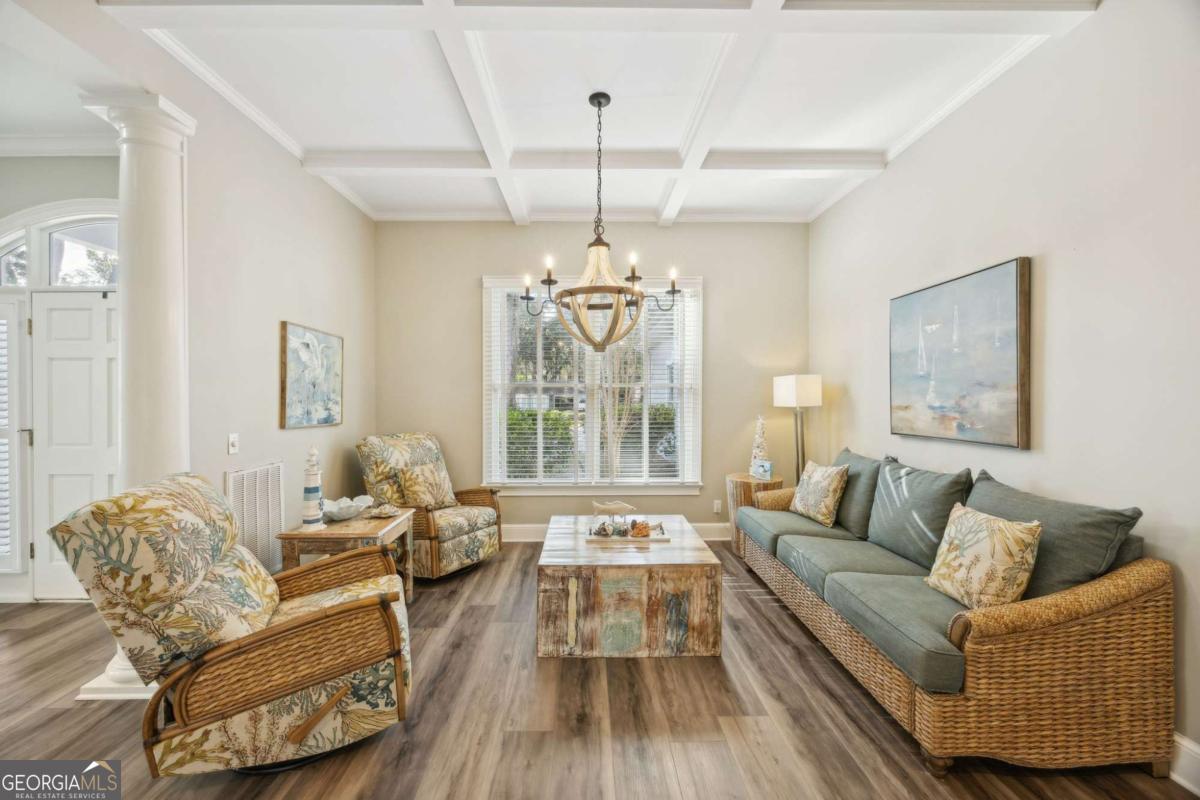 343 Major Wright Road St. Simons, GA 31522 - Photo 7 of 53 a living room with furniture and a large window