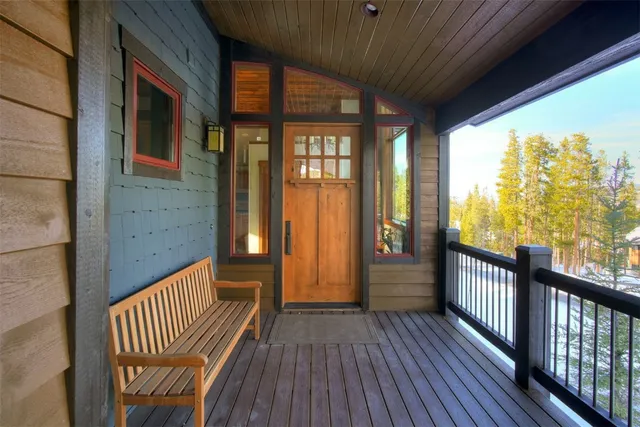 a view of balcony with wooden floor