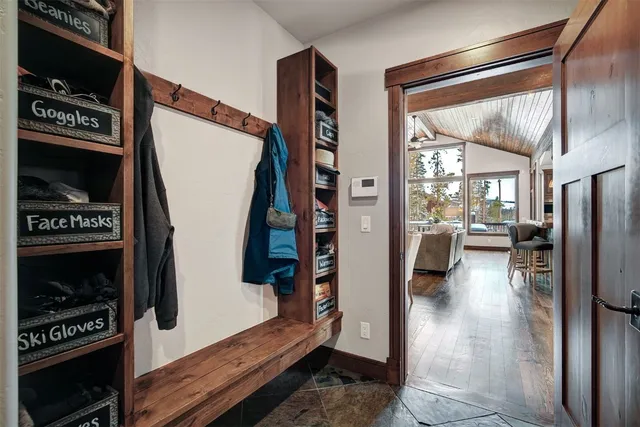 a view of a hallway with living room