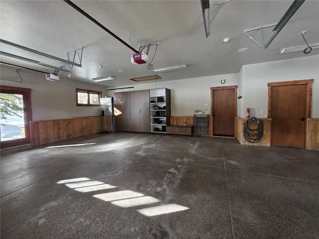 a view of a garage with furniture