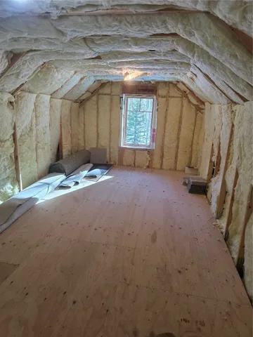 a view of empty room with windows