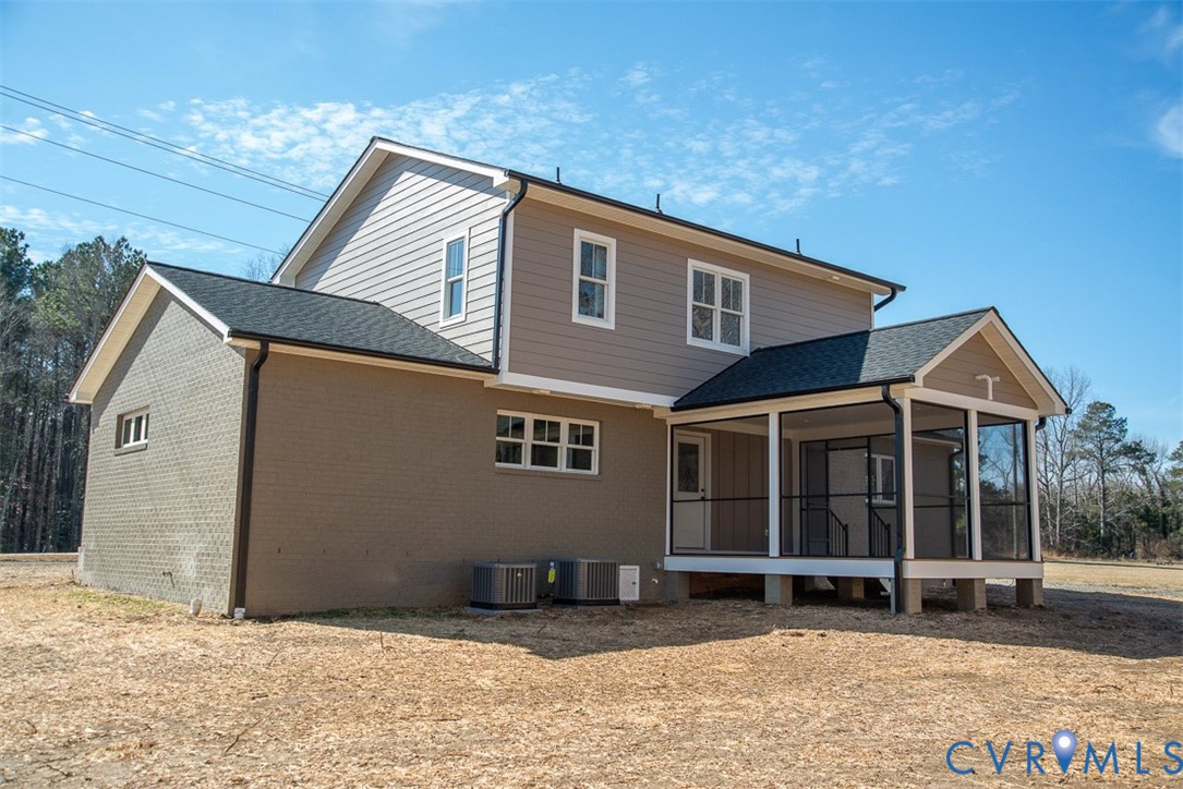 11092 Old Ridge Road Doswell, VA 23047 - Photo 11 of 63 a front view of a house with a yard