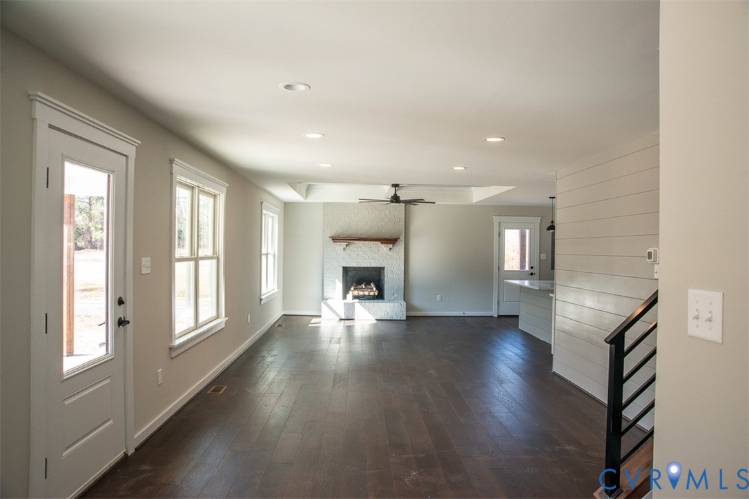 11092 Old Ridge Road Doswell, VA 23047 - Photo 19 of 63 a view of an empty room with wooden floor and a window