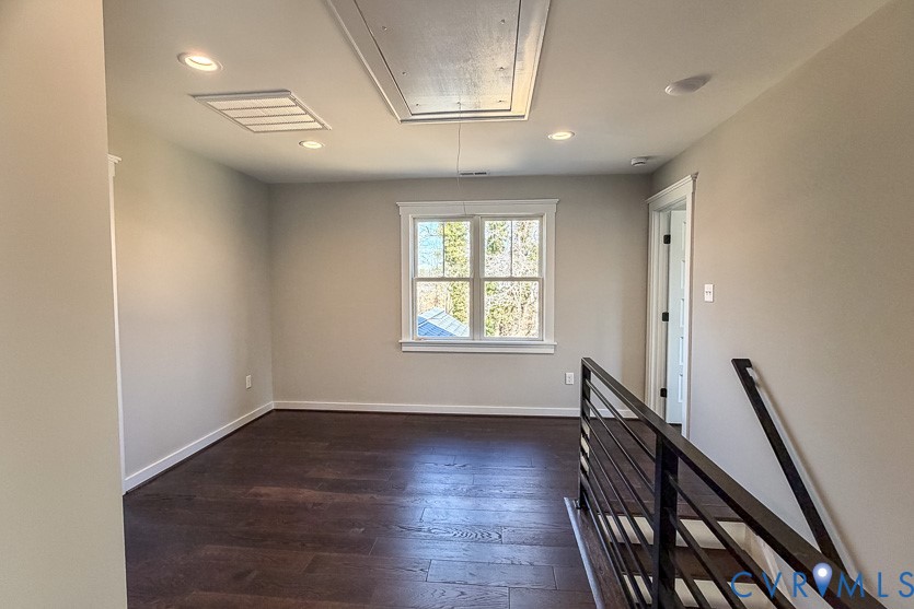 11092 Old Ridge Road Doswell, VA 23047 - Photo 43 of 63 a view of an empty room with wooden floor and a window