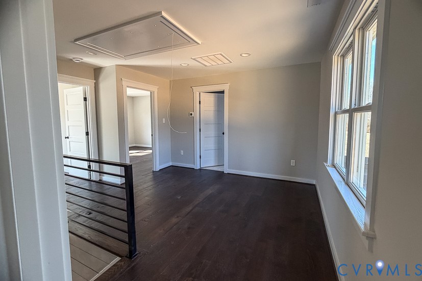11092 Old Ridge Road Doswell, VA 23047 - Photo 44 of 63 a view of a hallway with wooden floor and staircase