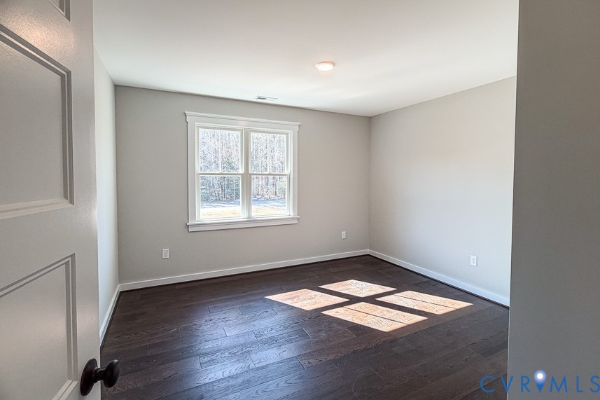 11092 Old Ridge Road Doswell, VA 23047 - Photo 48 of 63 an empty room with wooden floor and windows