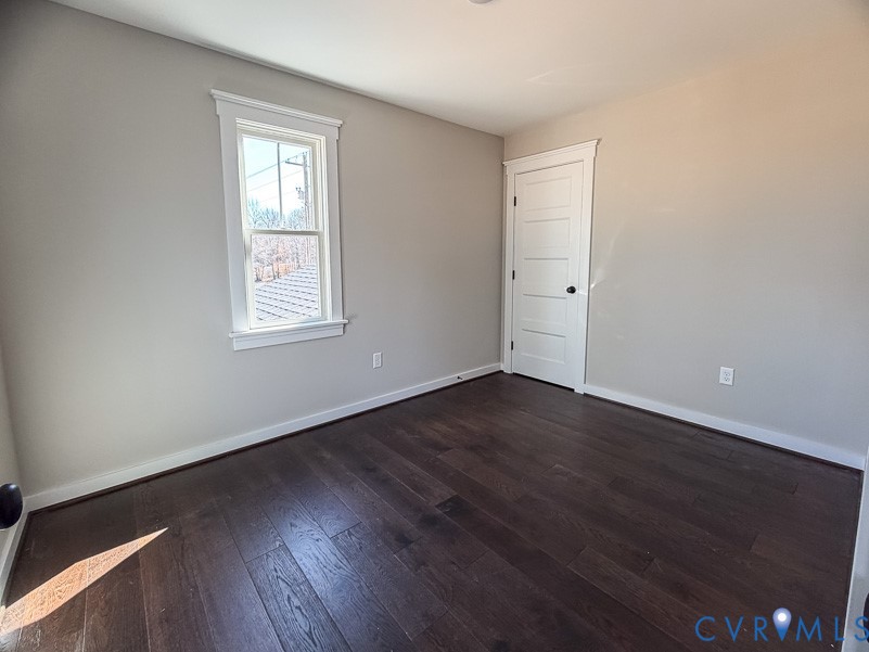 11092 Old Ridge Road Doswell, VA 23047 - Photo 55 of 63 an empty room with wooden floor and windows