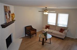 189 Merlin Way Euless, TX 76039 - Photo 20 of 20 a living room with furniture and a flat screen tv