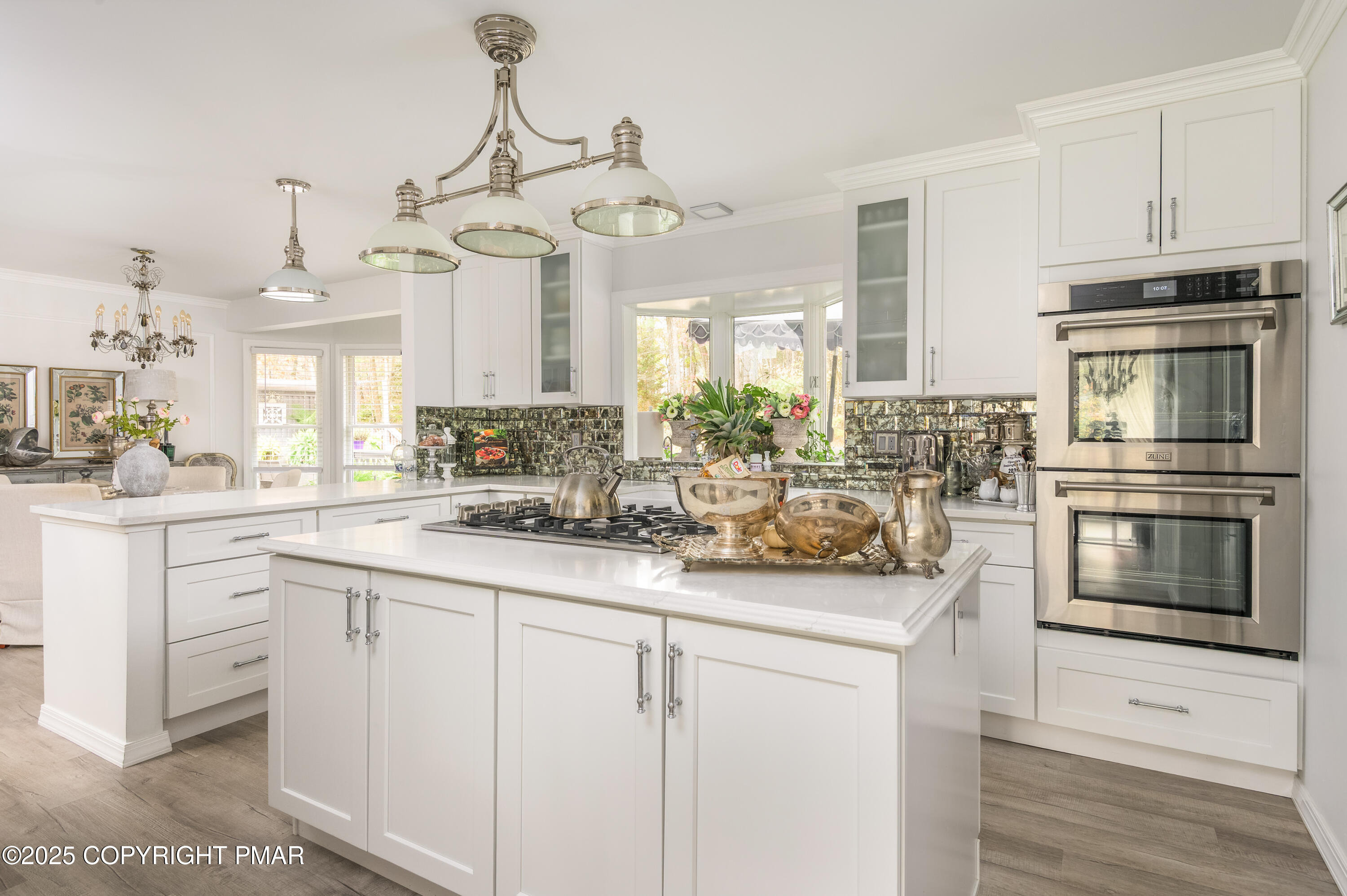 3038 Hemlock Road Stroudsburg, PA 18360 - Photo 12 of 64 a kitchen with kitchen island granite countertop a sink stainless steel appliances and cabinets