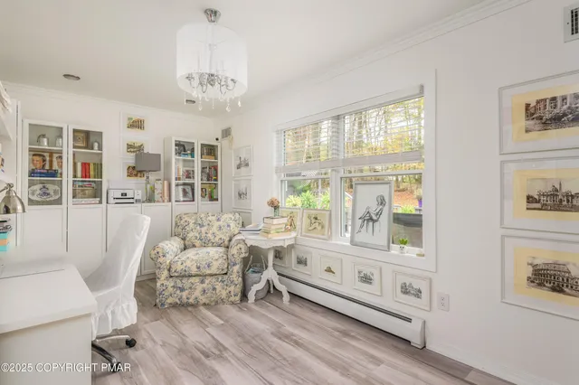 a view of a living room and entry way
