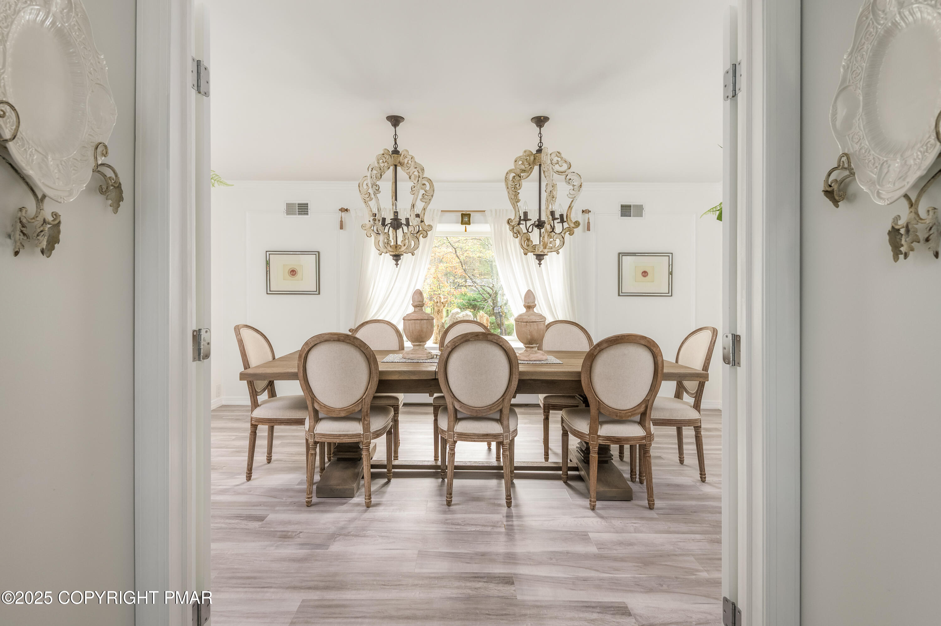 3038 Hemlock Road Stroudsburg, PA 18360 - Photo 20 of 64 a view of dining room and hall with wooden floor