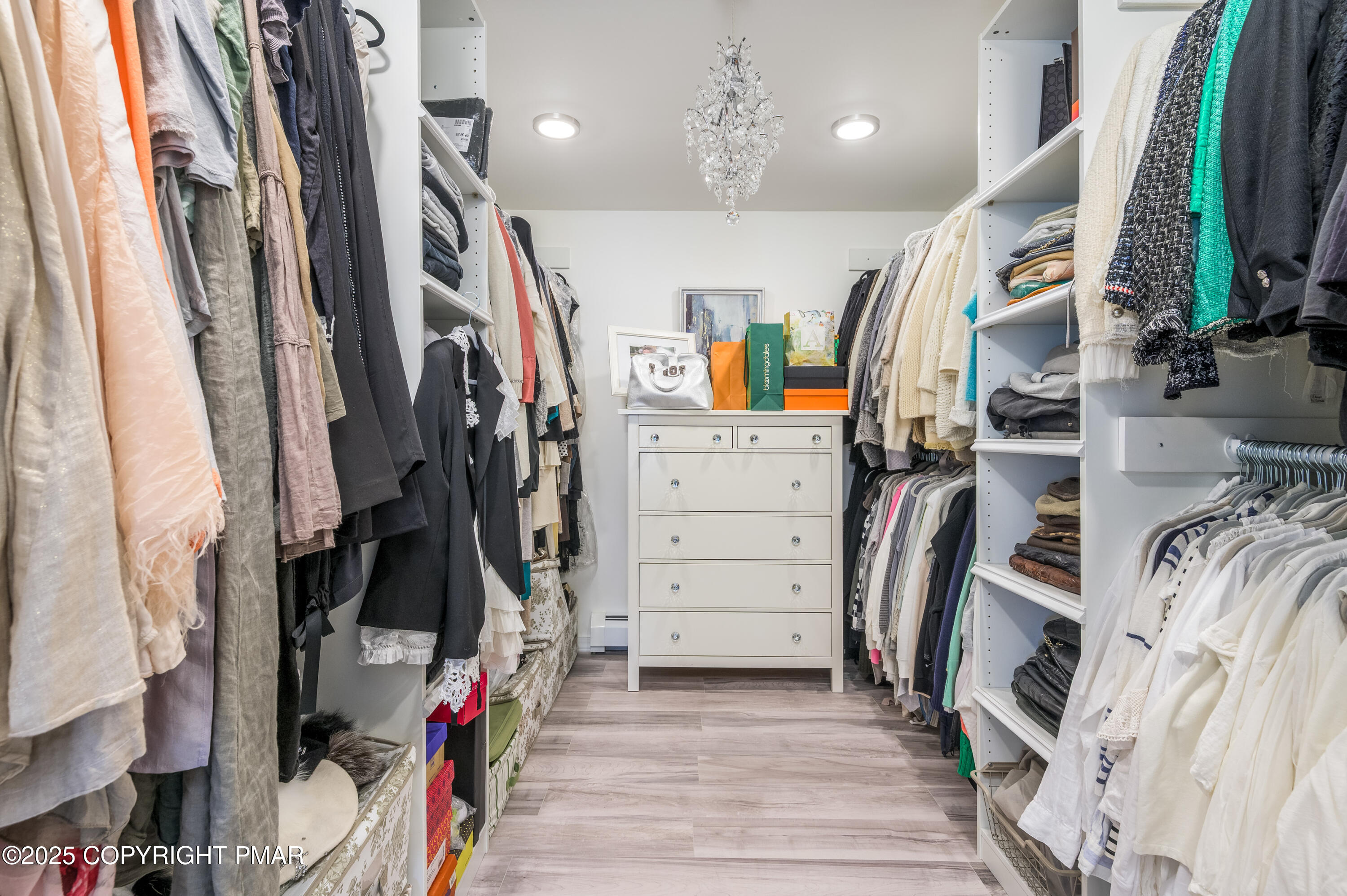 3038 Hemlock Road Stroudsburg, PA 18360 - Photo 26 of 64 a view of walk in closet with clothes and shoes