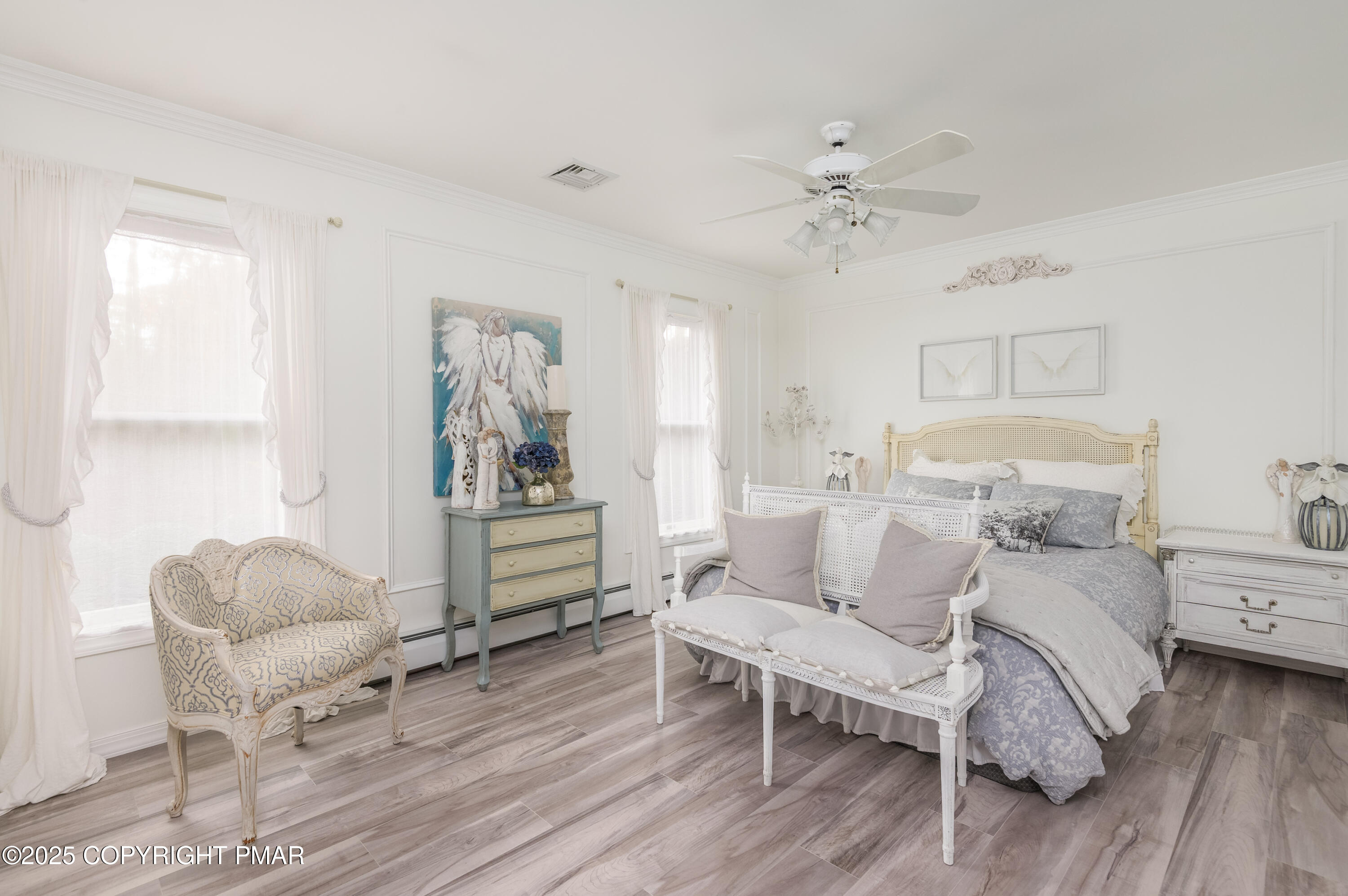 3038 Hemlock Road Stroudsburg, PA 18360 - Photo 36 of 64 a living room with furniture and a wooden floor