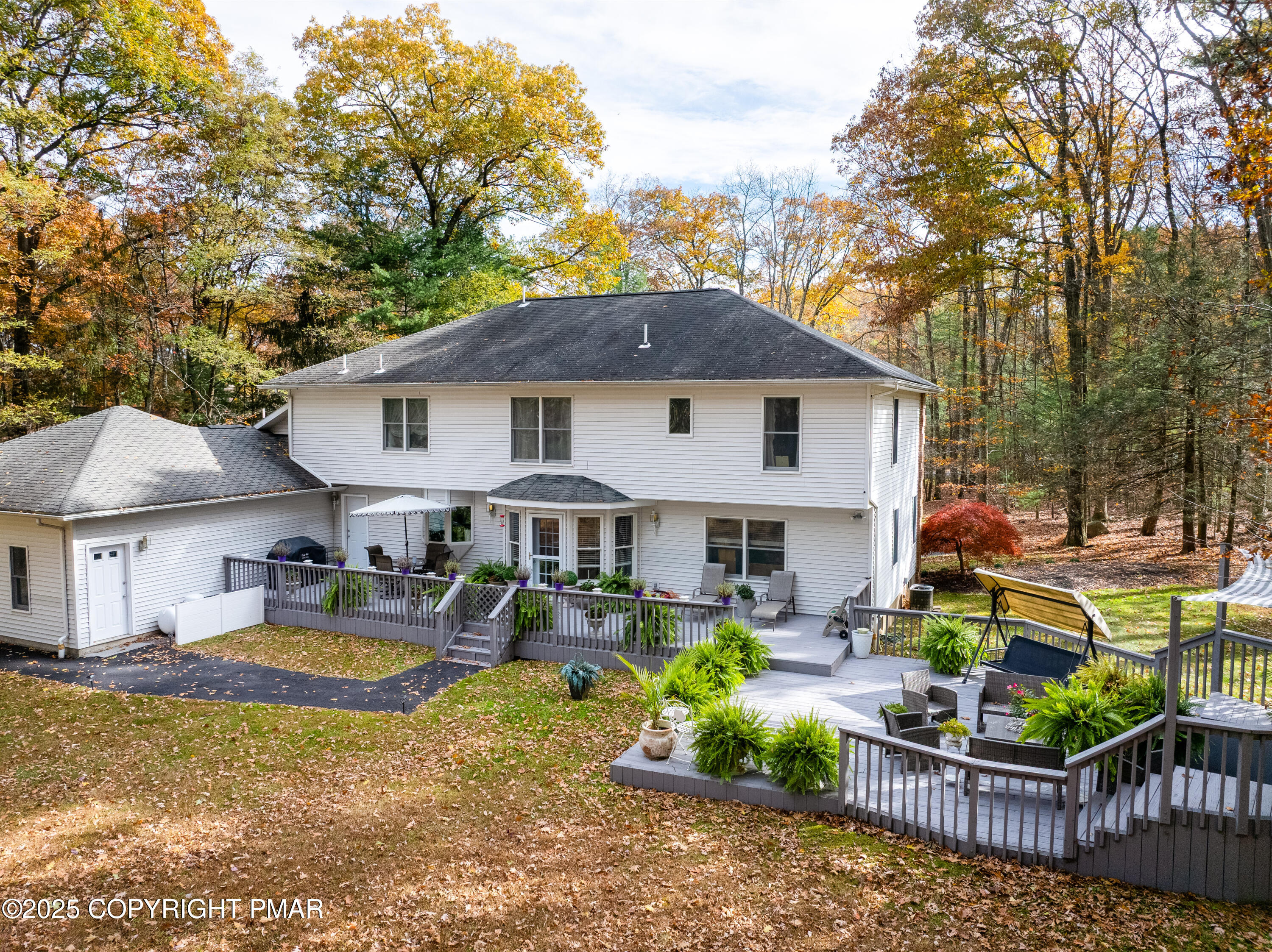 3038 Hemlock Road Stroudsburg, PA 18360 - Photo 48 of 64 a front view of house with outdoor seating yard and outdoor seating
