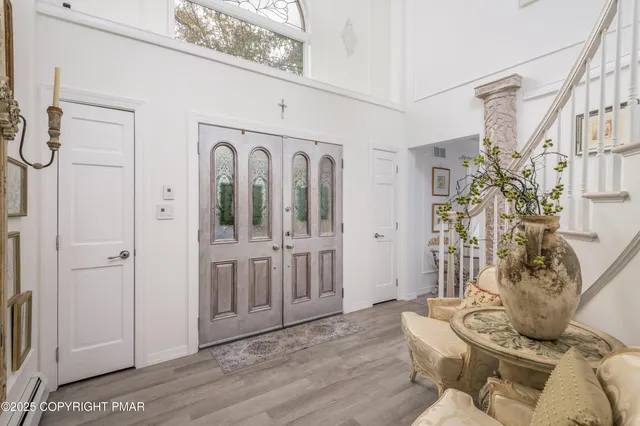 a kitchen with stainless steel appliances granite countertop a stove and a refrigerator