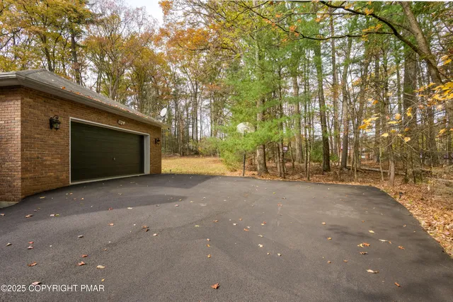 a view of a yard in front of a house