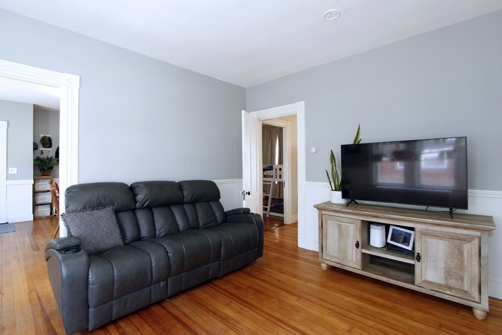 2 High Street Middleboro, MA 02346 - Photo 21 of 41 a living room with furniture and a flat screen tv
