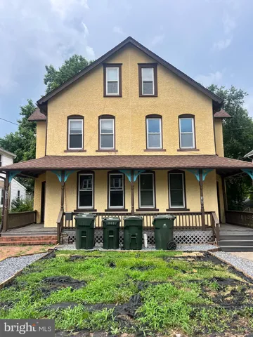 a front view of a house with garage