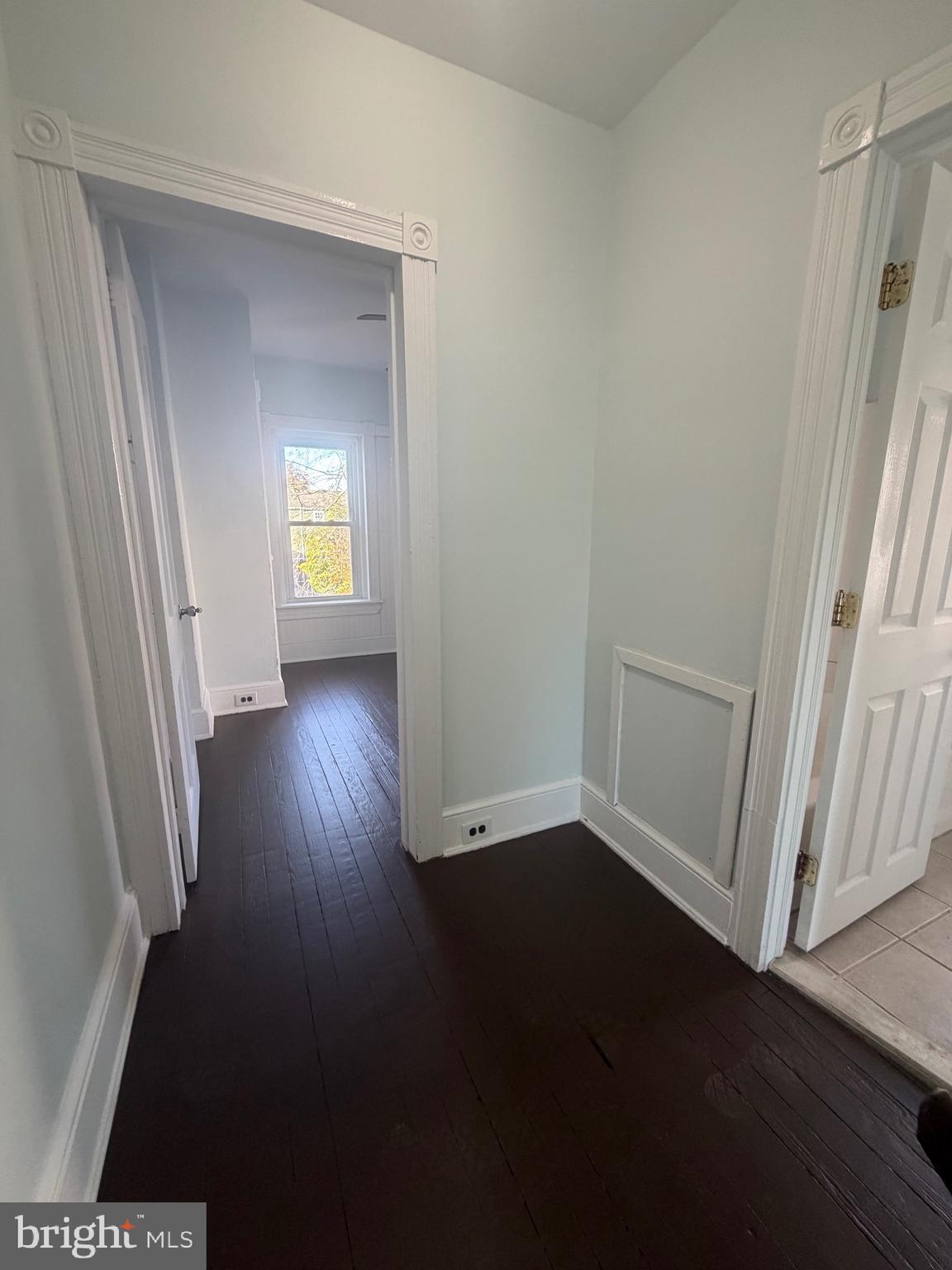 30 Prospect Avenue Newark, DE 19711 - Photo 10 of 23 an empty room with wooden floor and a window
