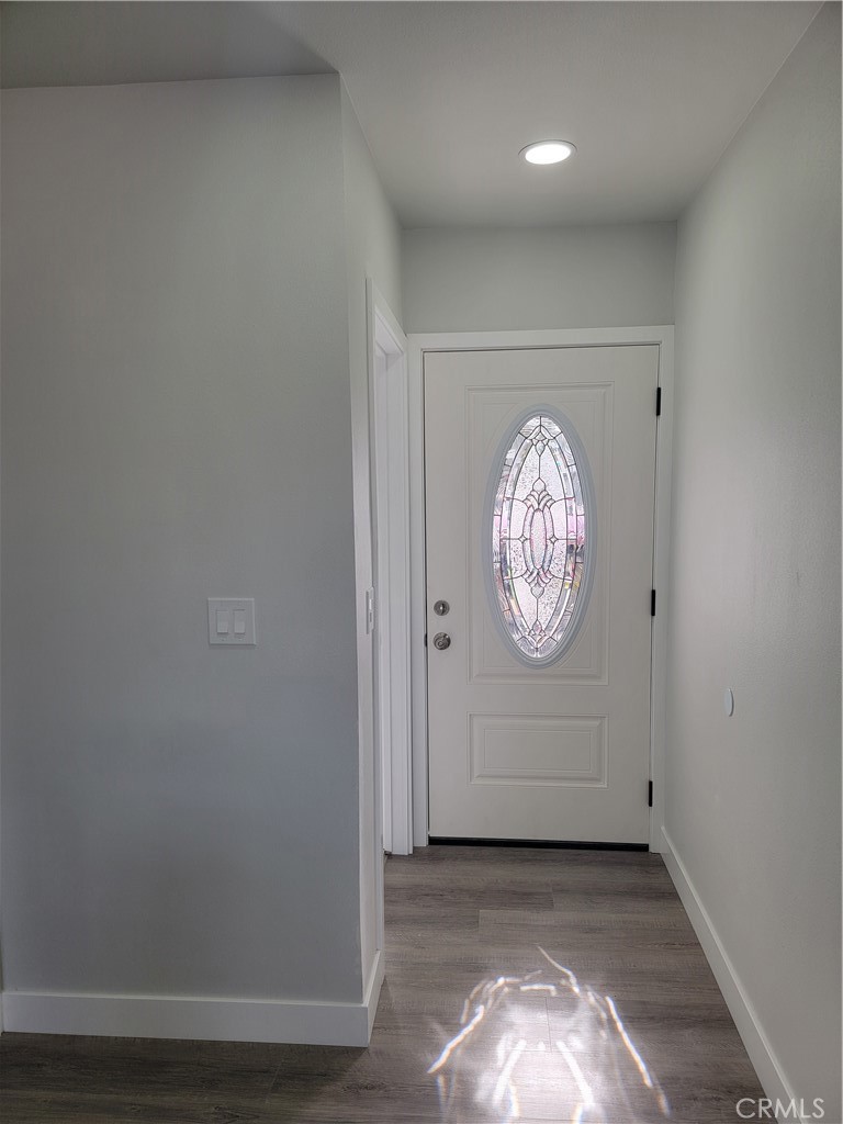 1637 Highland Street Santa Ana, CA 92703 - Photo 2 of 15 an empty room with cabinet and a window