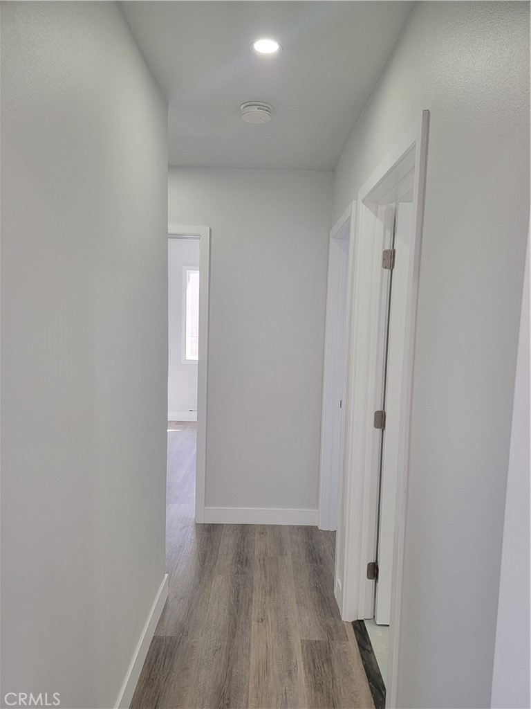 1637 Highland Street Santa Ana, CA 92703 - Photo 8 of 15 a view of hallway with wooden floor