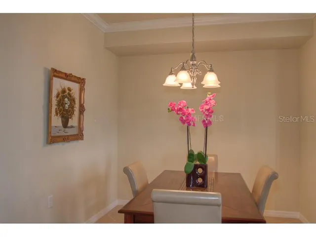 a vase of flowers sitting on a table
