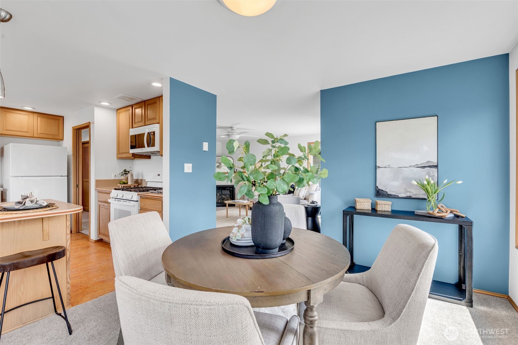 722 North 92nd Street, Unit 1 Seattle, WA 98103 - Photo 1 of 33 a dining room with furniture and wooden floor