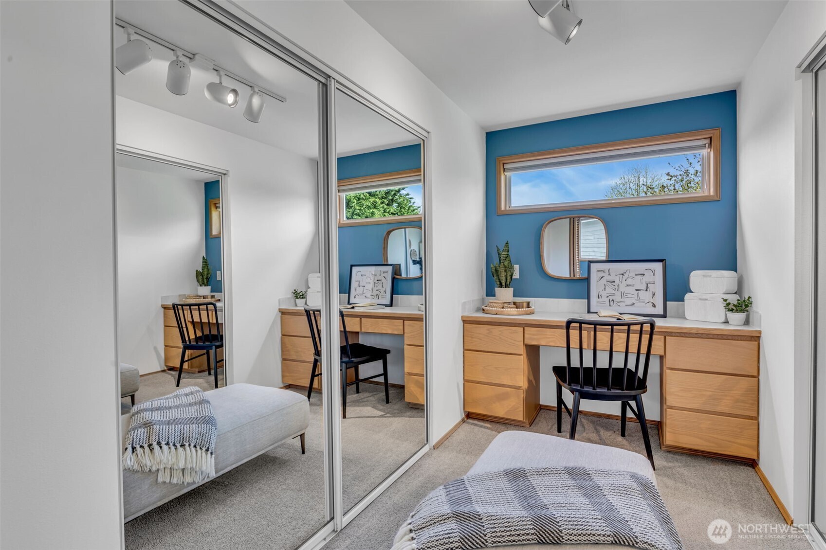 722 North 92nd Street, Unit 1 Seattle, WA 98103 - Photo 18 of 33 a bedroom with furniture and a wooden floor