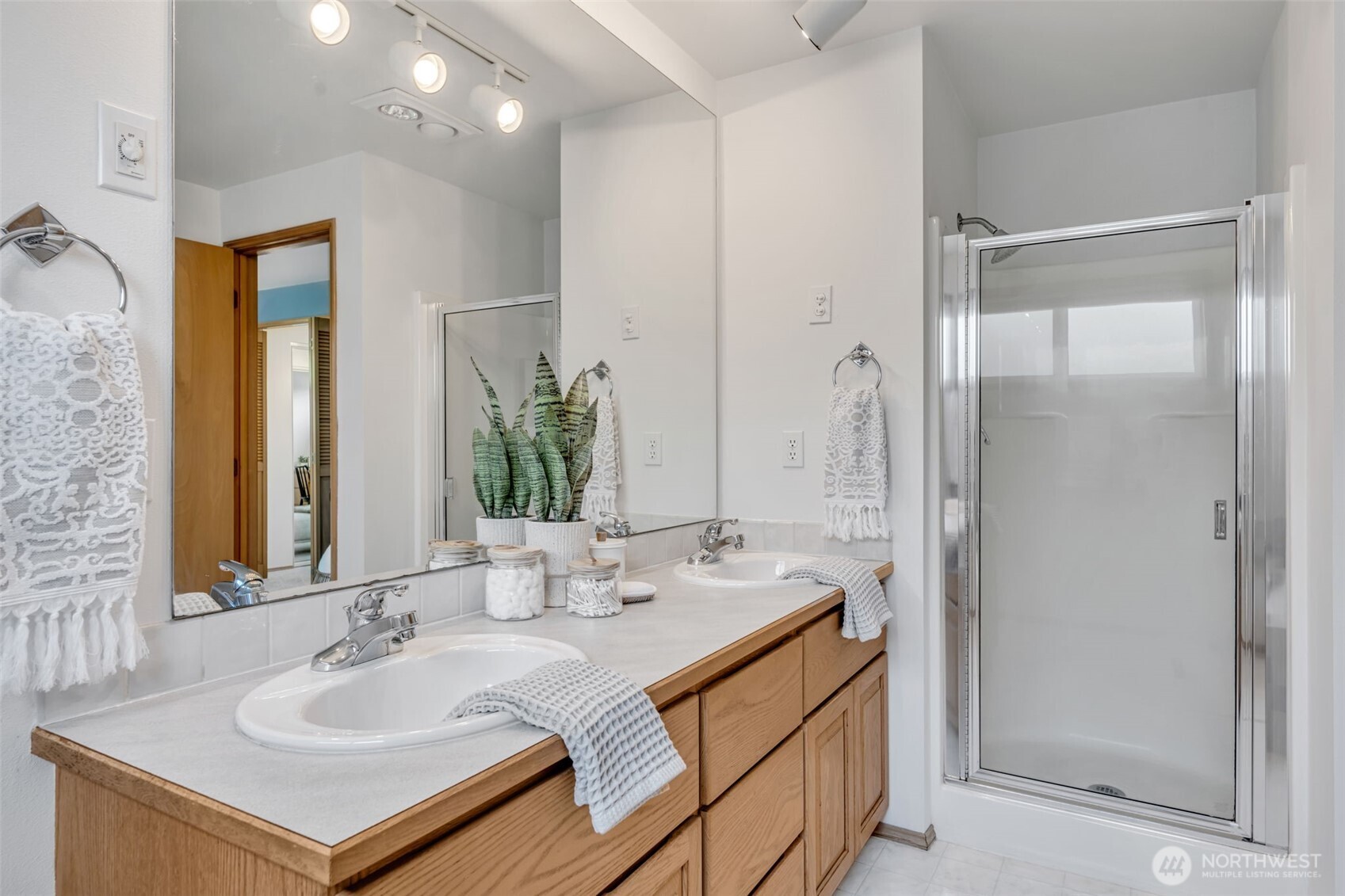 722 North 92nd Street, Unit 1 Seattle, WA 98103 - Photo 20 of 33 a bathroom with a sink and a mirror
