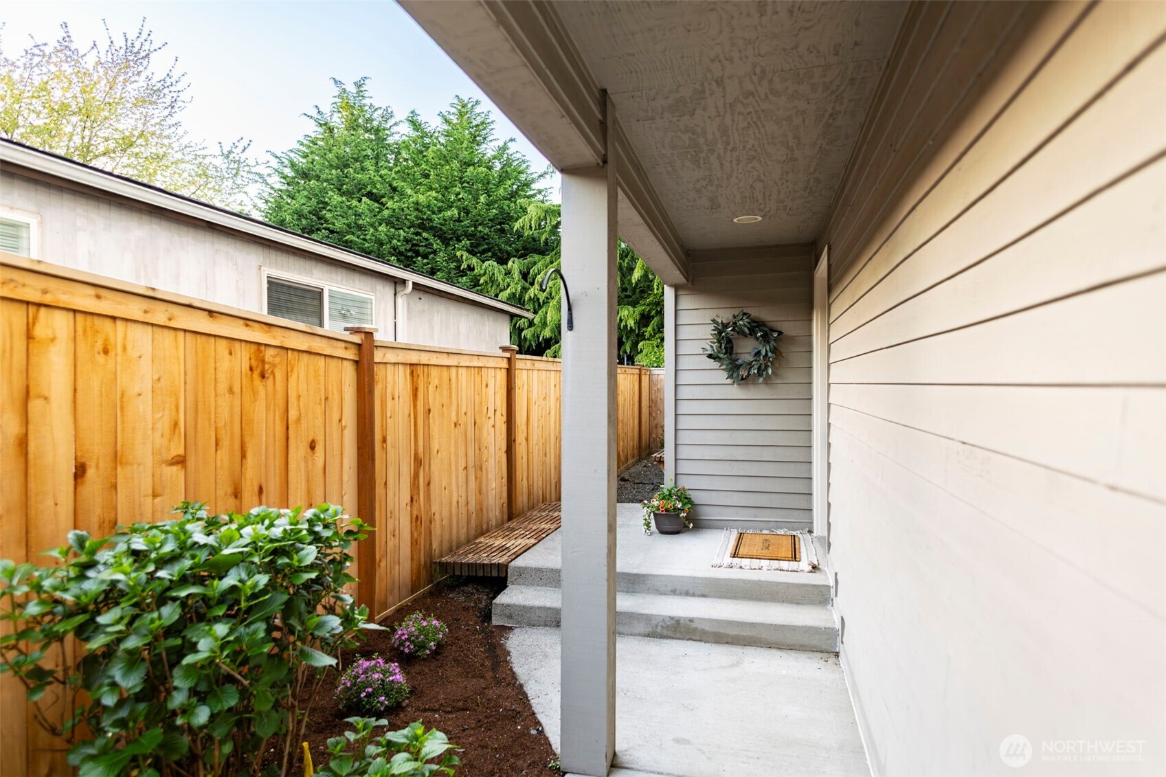 722 North 92nd Street, Unit 1 Seattle, WA 98103 - Photo 2 of 33 a porch with seating space