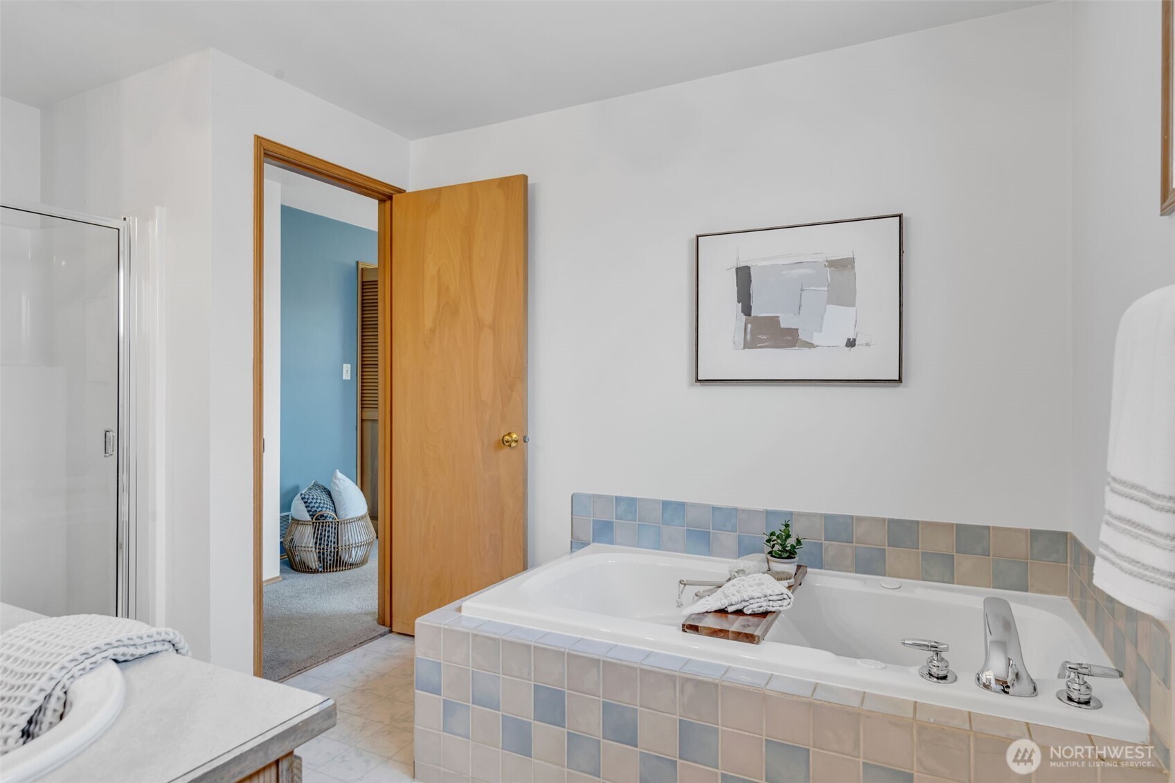 722 North 92nd Street, Unit 1 Seattle, WA 98103 - Photo 21 of 33 a bathroom with a bathtub and shower