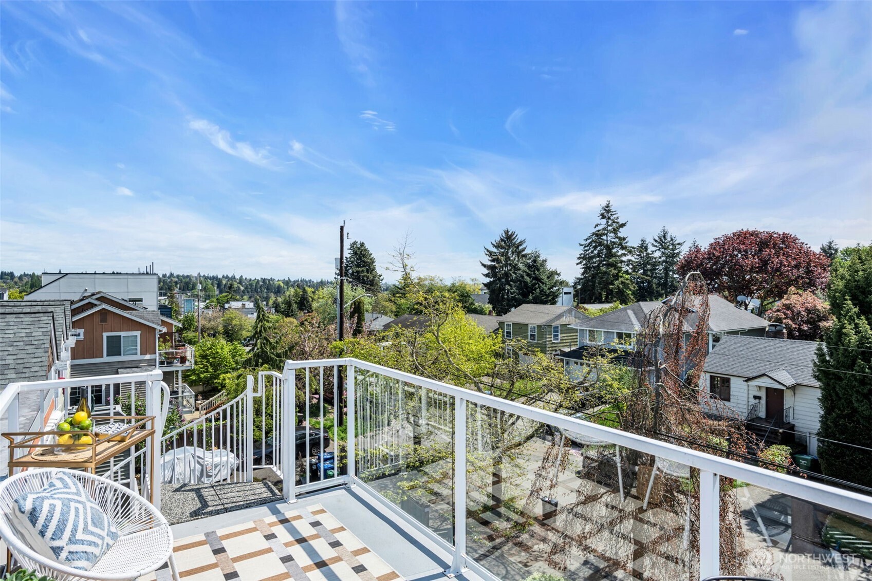 722 North 92nd Street, Unit 1 Seattle, WA 98103 - Photo 27 of 33 a view of a balcony with chairs