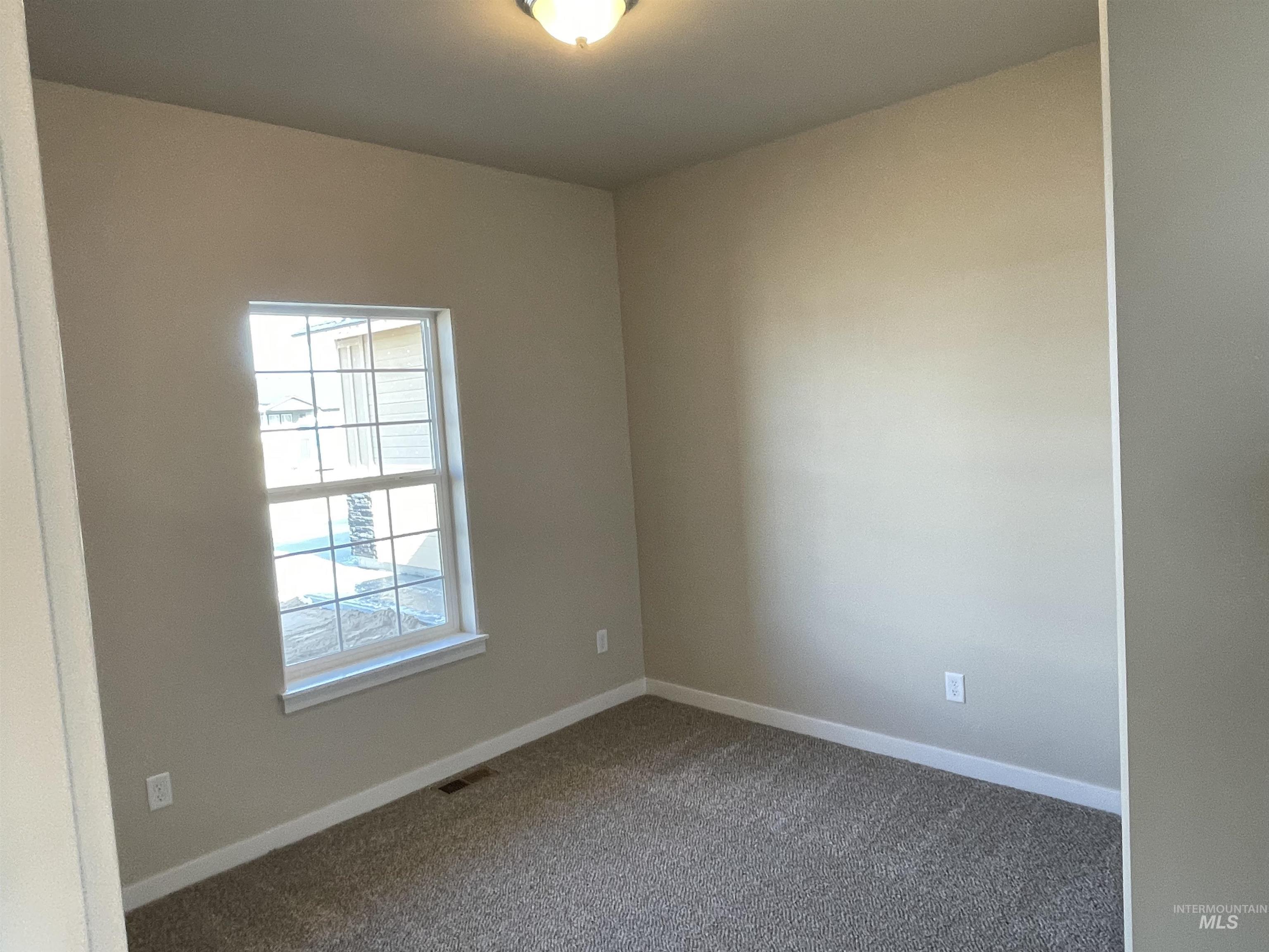 961 Quartz Road Kimberly, ID 83341 - Photo 14 of 19 Spare room with baseboards and carpet floors