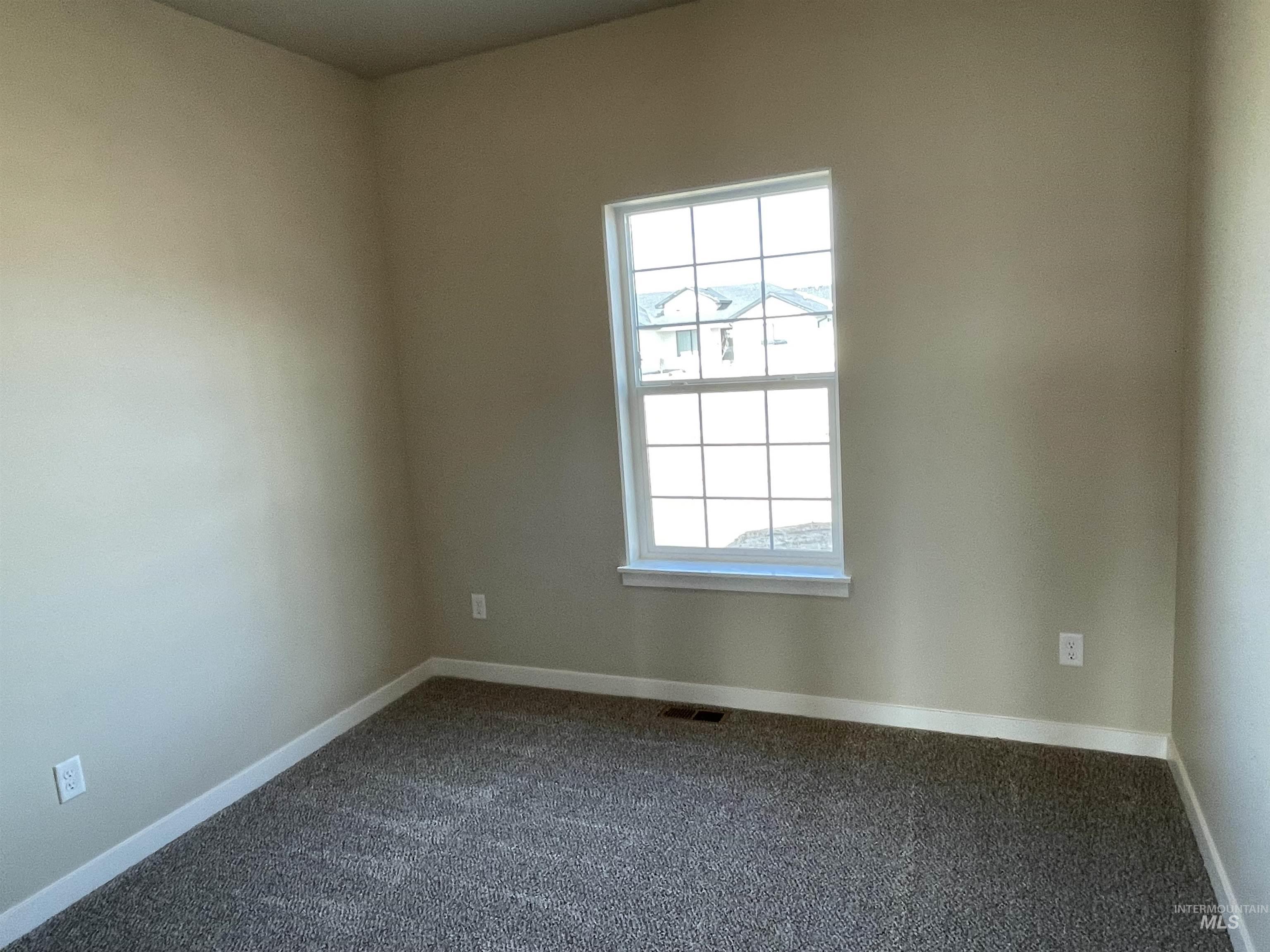 961 Quartz Road Kimberly, ID 83341 - Photo 15 of 19 Empty room featuring carpet and baseboards