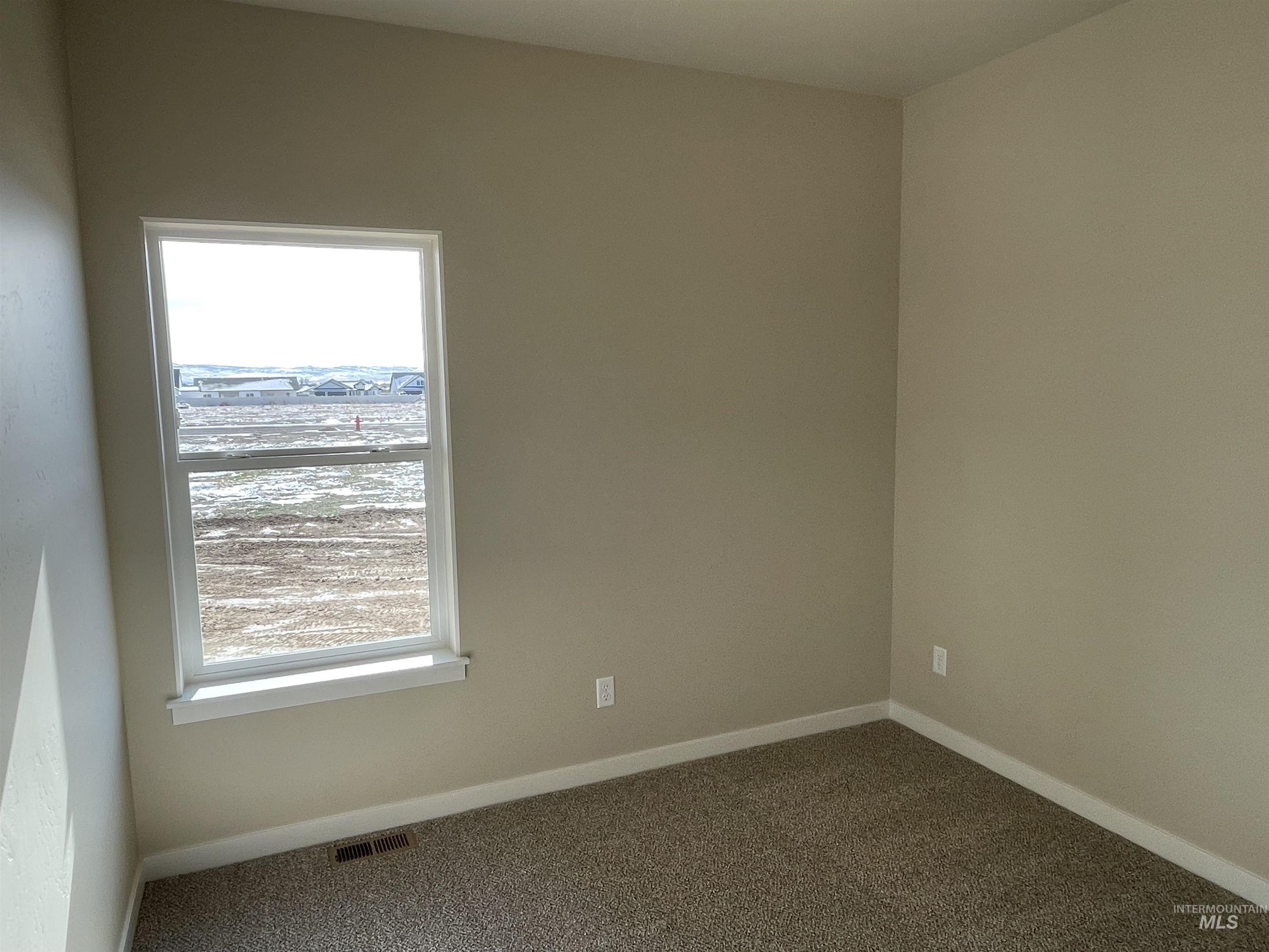 961 Quartz Road Kimberly, ID 83341 - Photo 18 of 19 Spare room with carpet flooring
