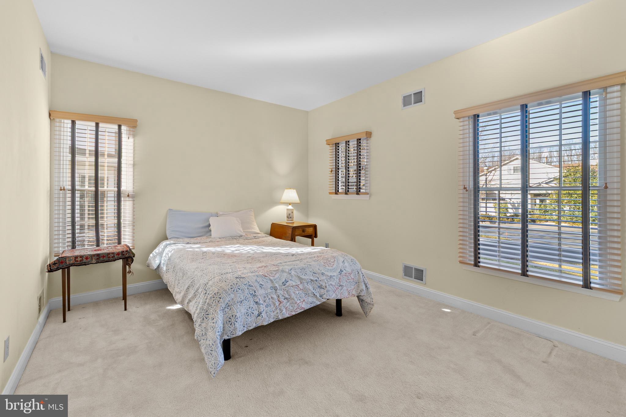 47 Hedge Row Road Princeton, NJ 08540 - Photo 14 of 21 a bedroom with a bed and a large window