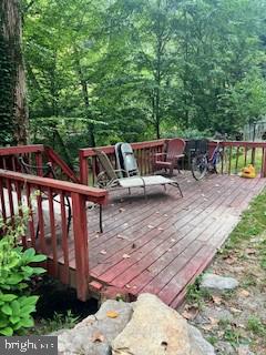 48 Trolley Road Pequea, PA 17565 - Photo 4 of 8 a view of a wooden deck with furniture
