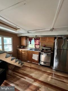 48 Trolley Road Pequea, PA 17565 - Photo 5 of 8 a living room with stainless steel appliances kitchen island a stove and a refrigerator