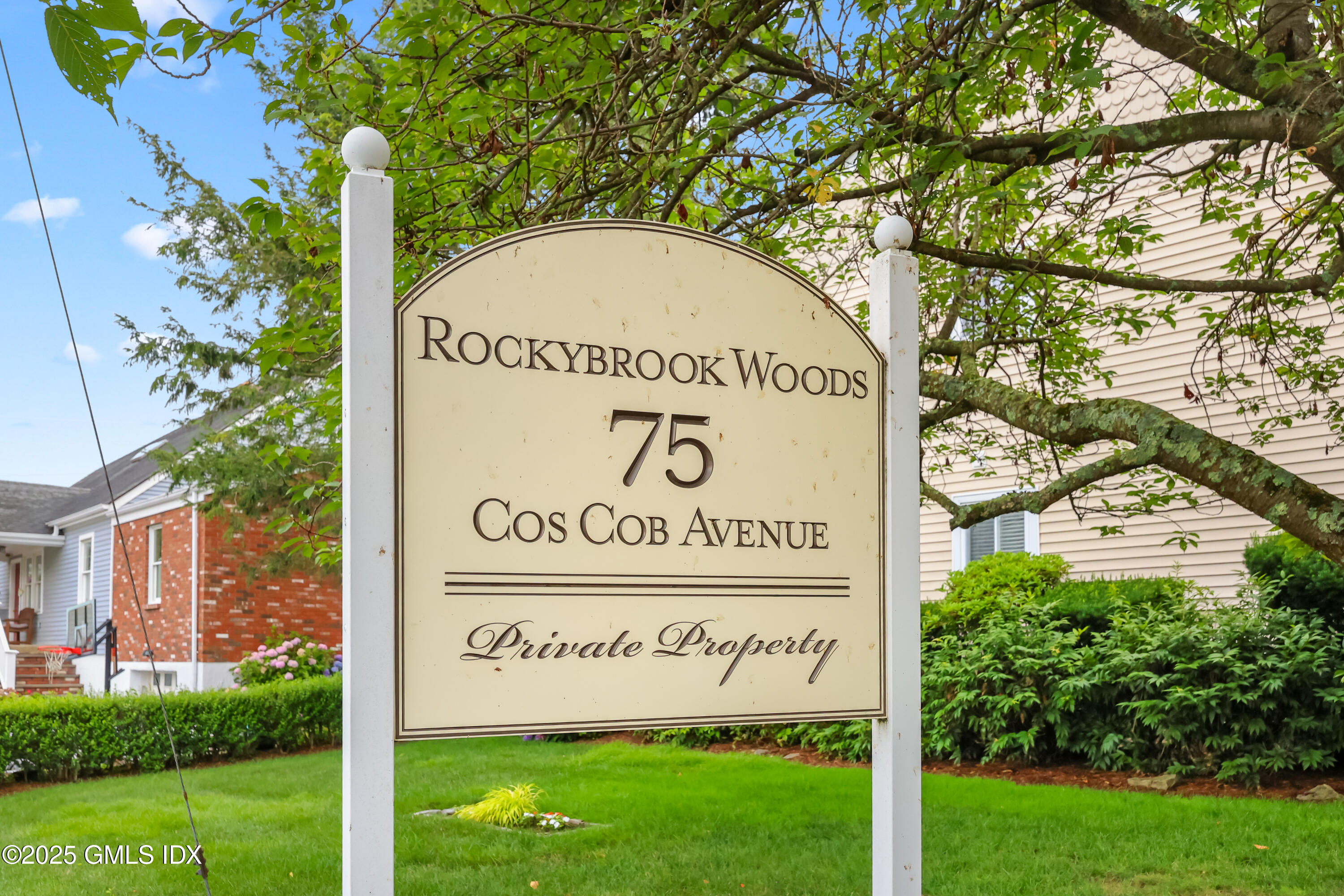 75 Cos Cob Avenue, Unit 14 Cos Cob, CT 06807 - Photo 28 of 28 a sign on the side of a building