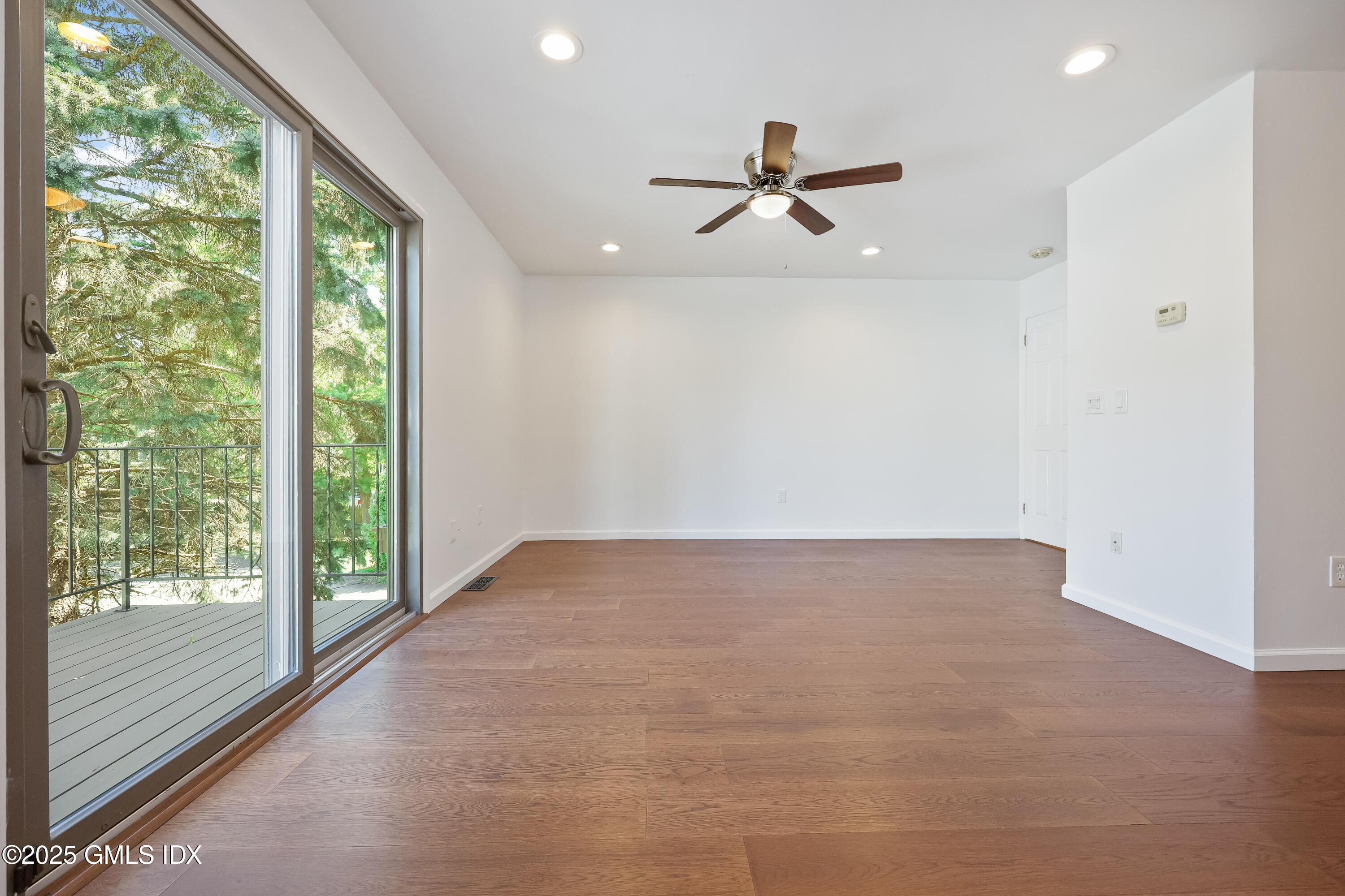 75 Cos Cob Avenue, Unit 14 Cos Cob, CT 06807 - Photo 8 of 28 a view of an empty room with a window