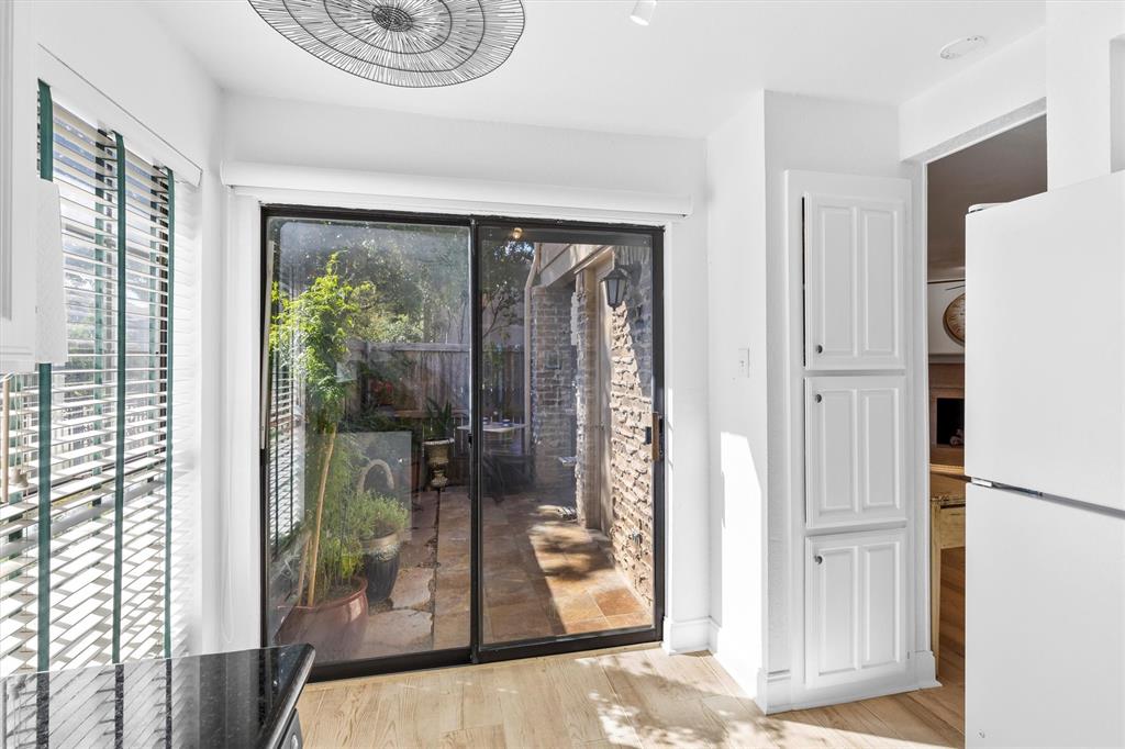 5200 Martel Avenue, Unit 32B Dallas, TX 75206 - Photo 11 of 35 a very nice looking room with a large window and front door