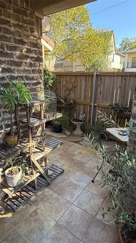a backyard of a house with outdoor seating