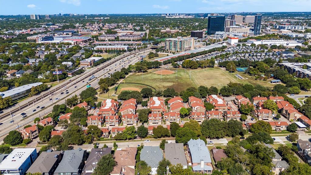 5200 Martel Avenue, Unit 32B Dallas, TX 75206 - Photo 27 of 35 an aerial view of residential houses with outdoor space