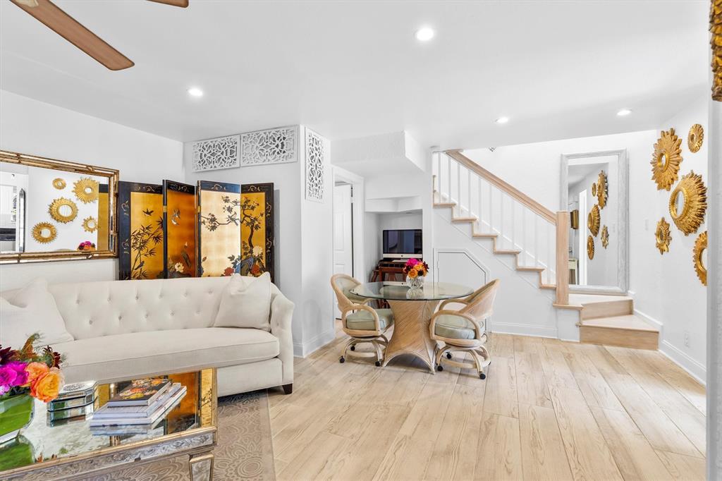 5200 Martel Avenue, Unit 32B Dallas, TX 75206 - Photo 3 of 35 a living room with furniture and a large window