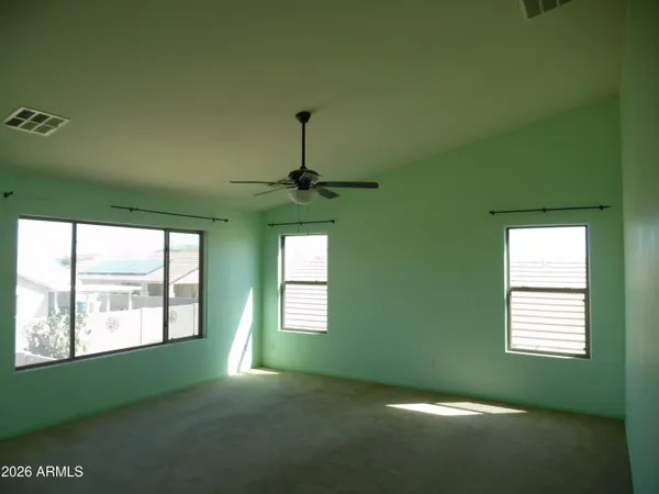 a bathroom with a double vanity sink and mirror