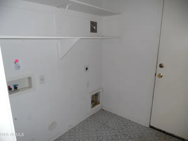 a view of a room with racks on the wall