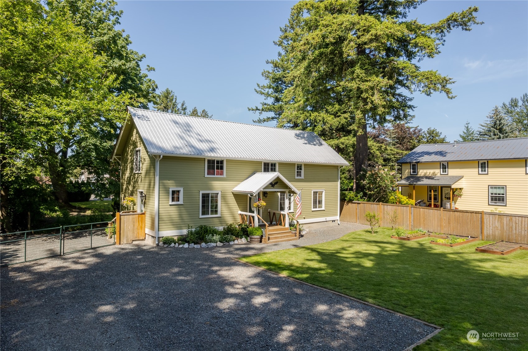402 West 3rd Street Nooksack, WA 98276 - Photo 11 of 36 a front view of a house with a yard