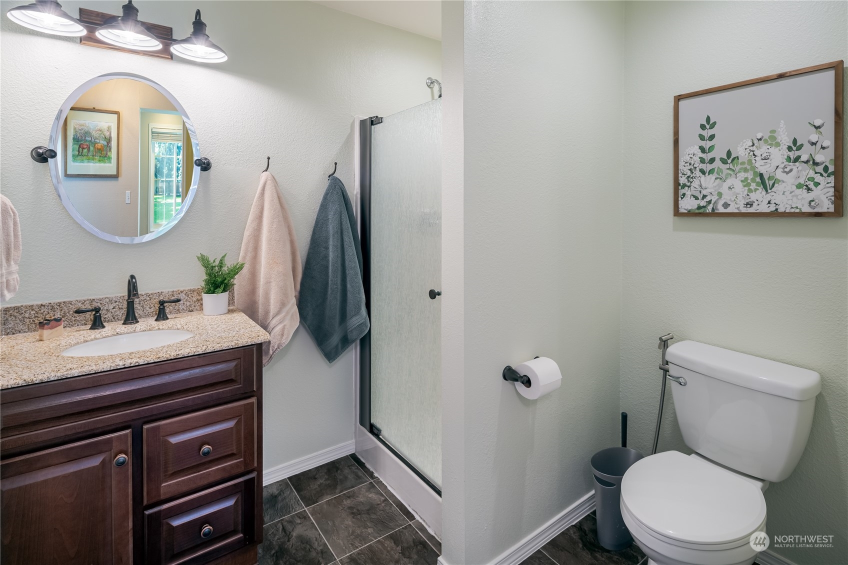 402 West 3rd Street Nooksack, WA 98276 - Photo 28 of 36 a bathroom with a granite countertop toilet sink and mirror